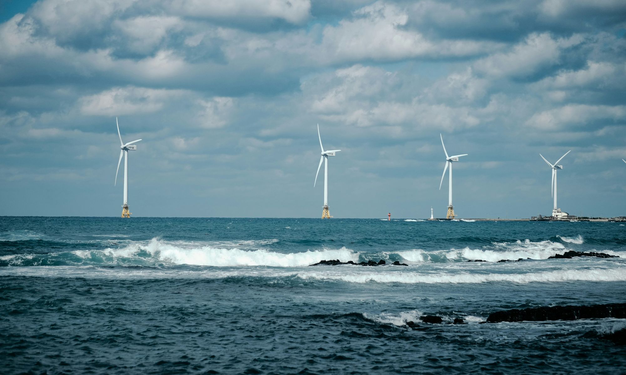 Offshore wind turbines in a choppy sea