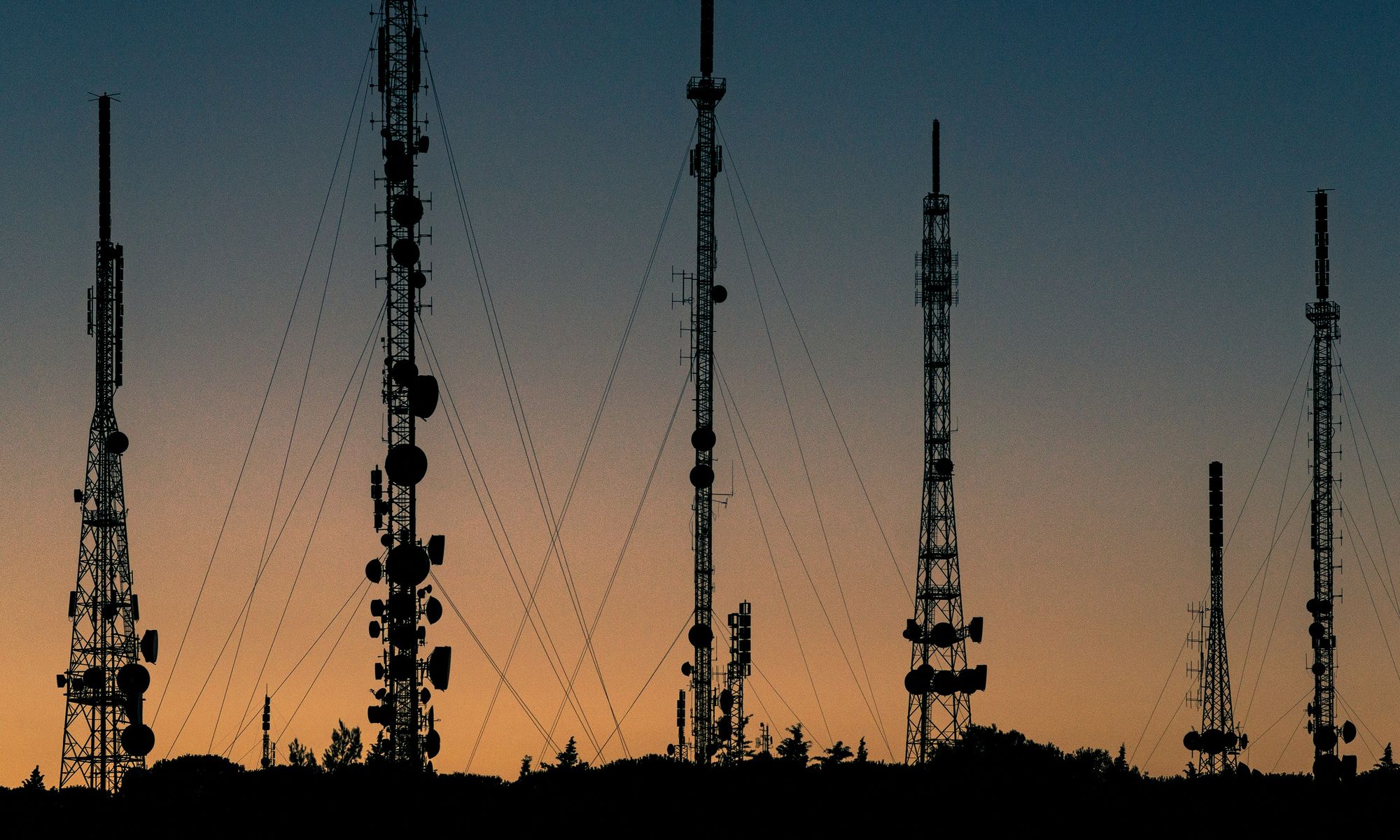 Telecommunications towers at dusk